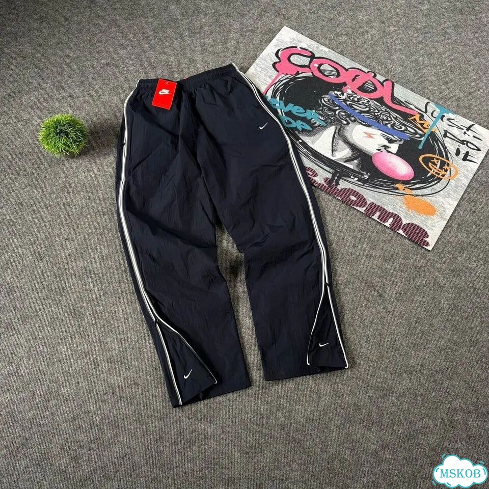 Штаны спортивные Nike flared синие мужские фото 1