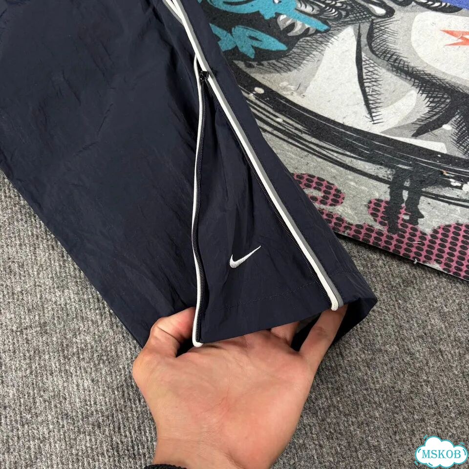 Штаны спортивные Nike flared синие мужские фото 10