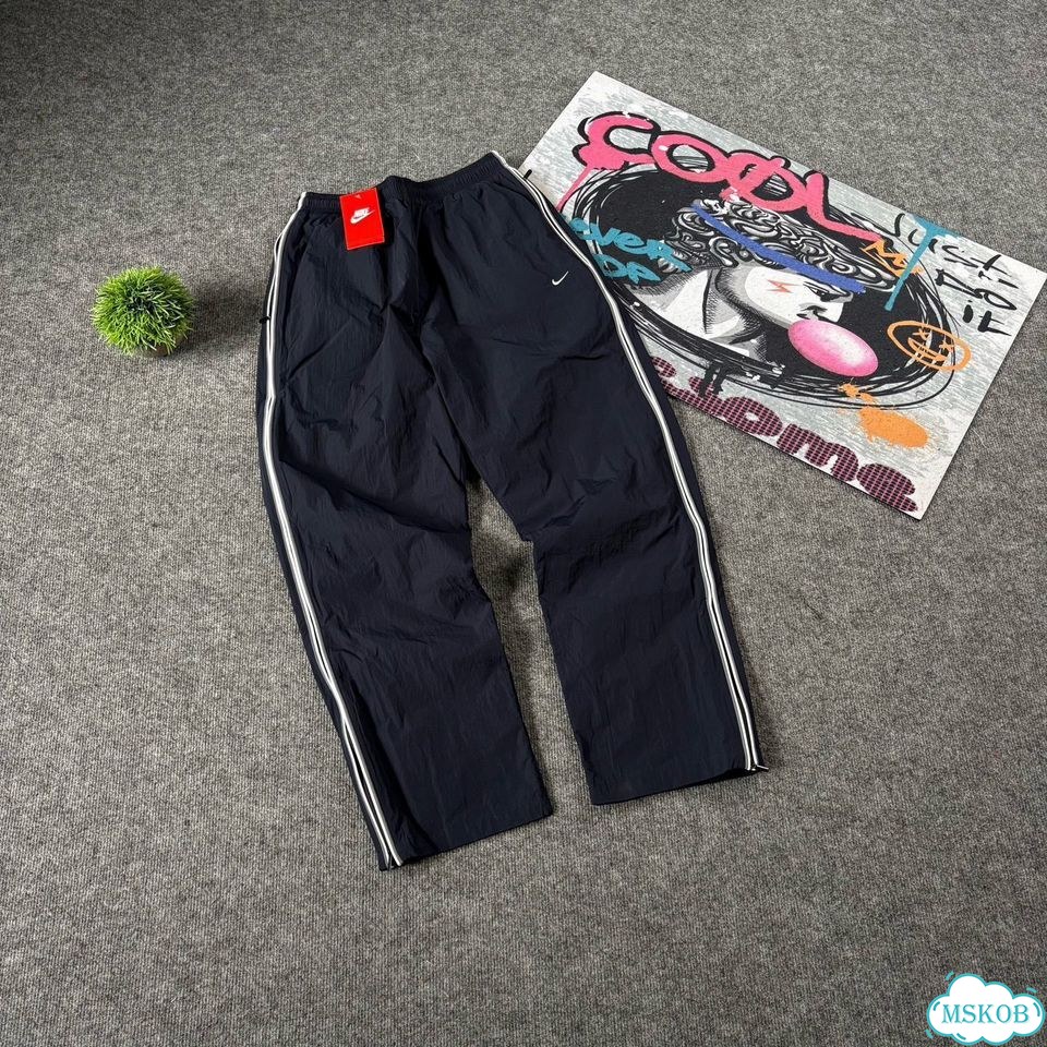 Штаны спортивные Nike flared синие мужские фото 2