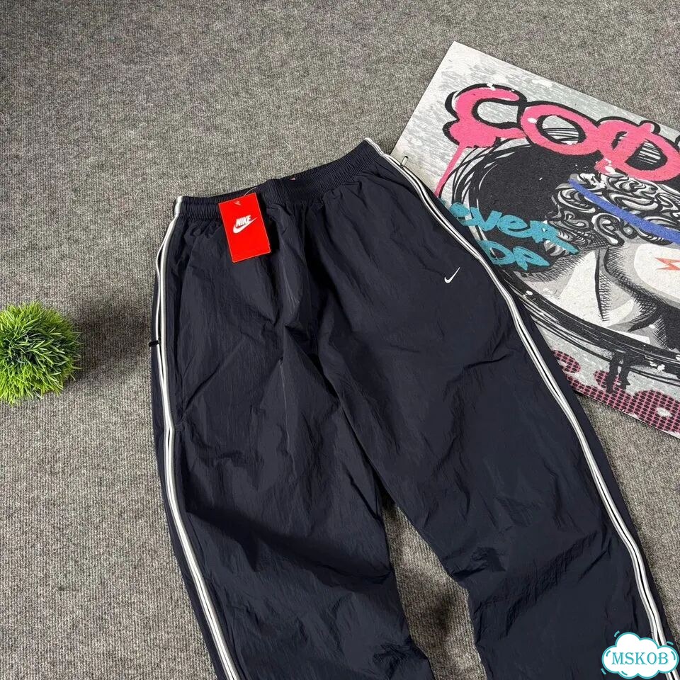 Штаны спортивные Nike flared синие мужские фото 3