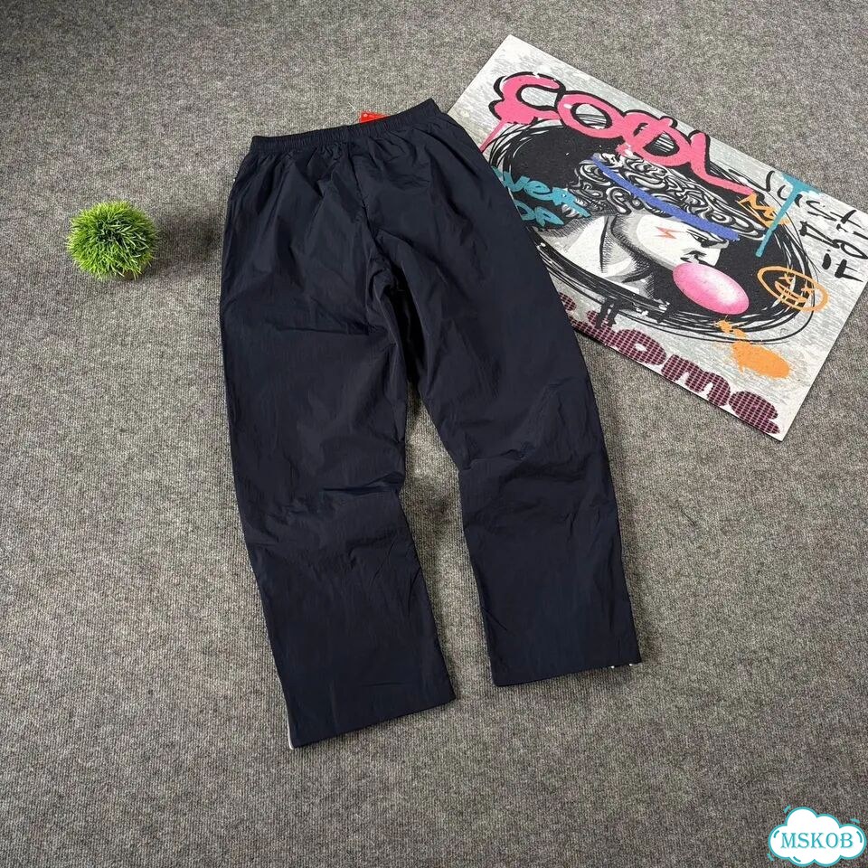 Штаны спортивные Nike flared синие мужские фото 8