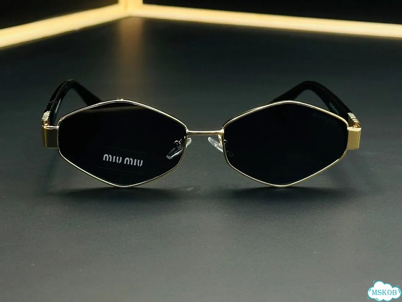 Солнцезащитные очки женские miu miu фото 4
