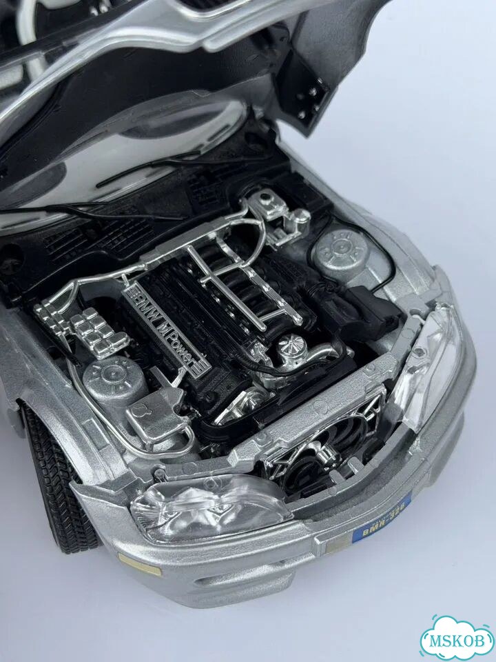 Модель автомобиля 1/18 BMW M Roadster Bburago фото 5