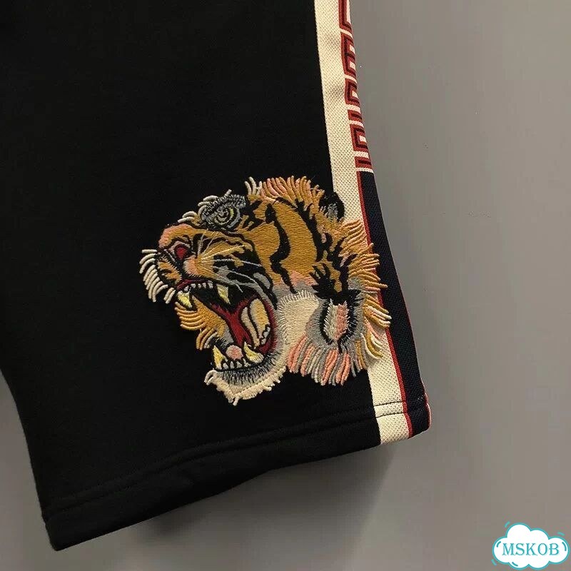 Шорты Guess Gucci Tiger на руках фото 2