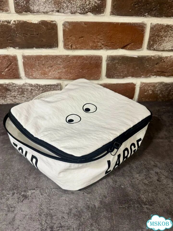 Косметичка кейс Anya Hindmarch Uniqlo фото 2