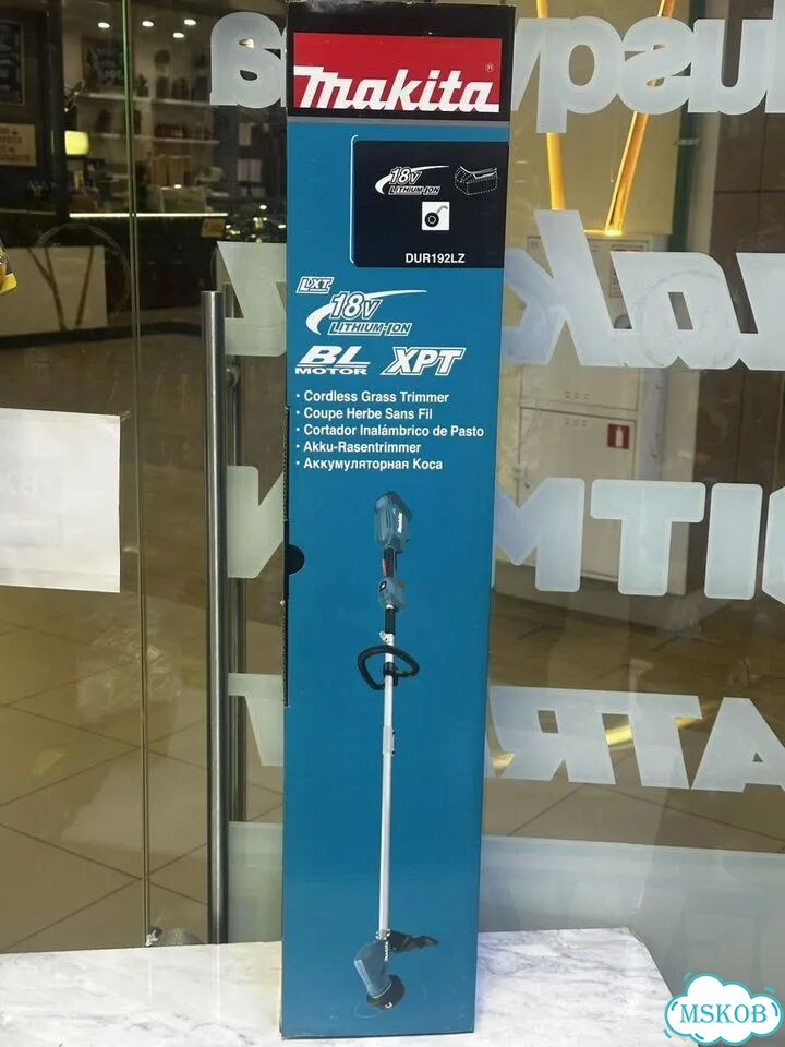 Аккумуляторный триммер Makita LXT DUR192LZ фото 1