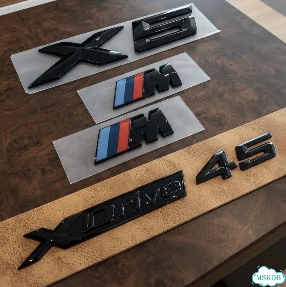 Черные эмблемы X5 G кузов фото 2