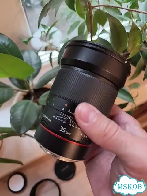 Объектив Samyang 35mm 1.4 canon ef фото 1