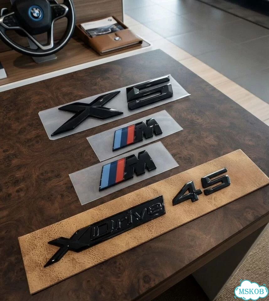 Черные эмблемы X5 G кузов фото 1