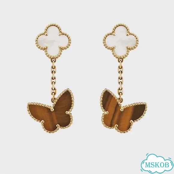 Серьги Van Cleef Arpels Lucky Alhambra 2 мотива фото 1