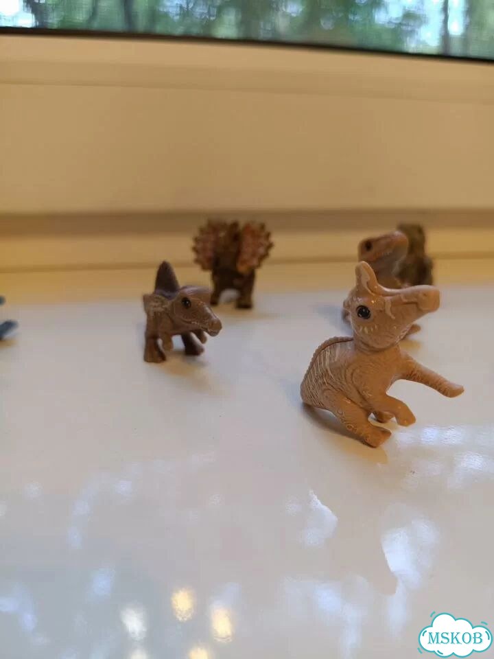 Динозавры игрушки фото 6