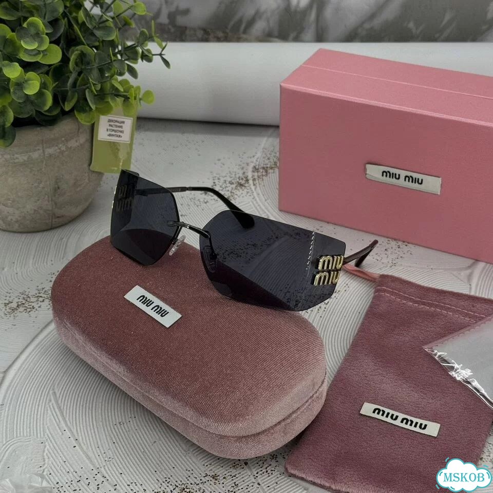 Солнцезащитные очки Miu Miu широкая маска фото 1