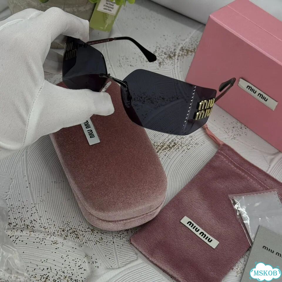 Солнцезащитные очки Miu Miu широкая маска фото 3