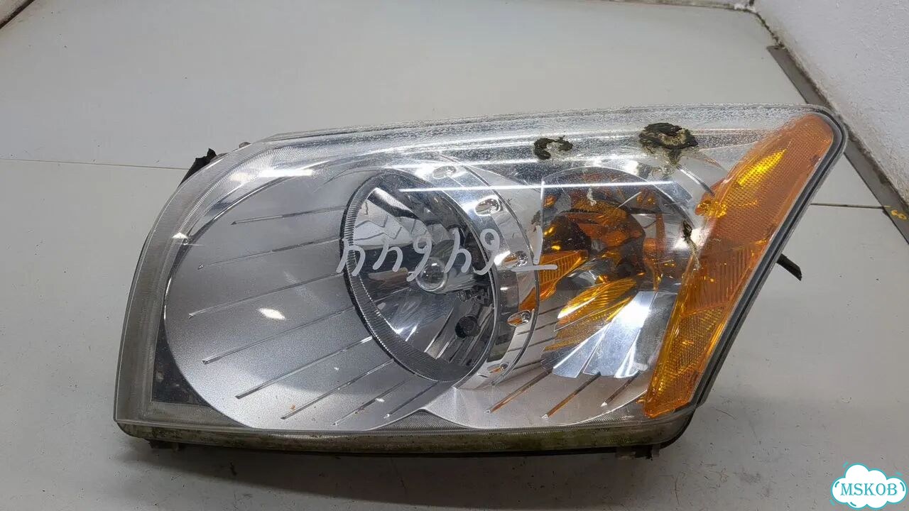 Фара (передняя) левая Dodge Caliber фото 1
