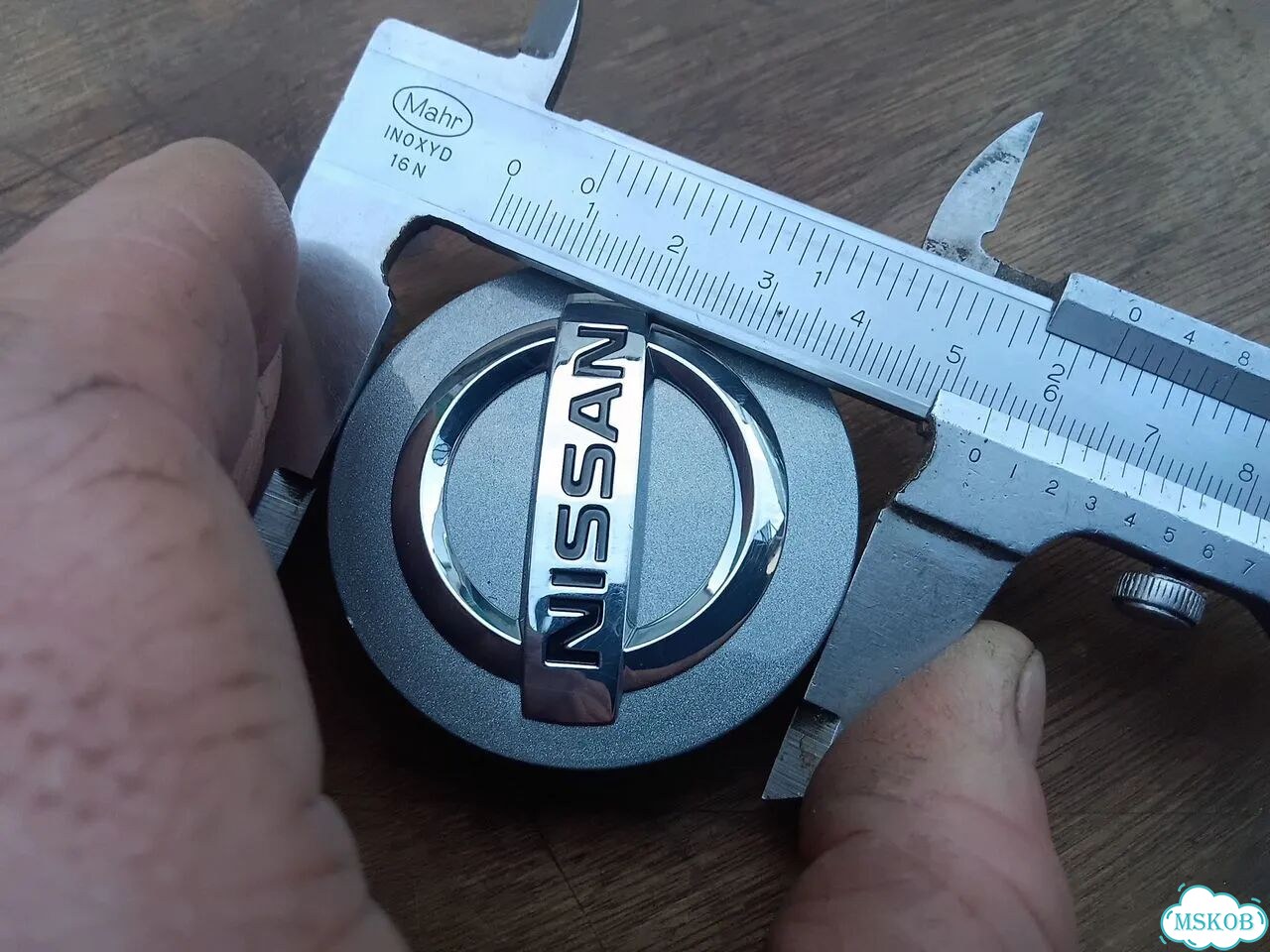 Колпачок литого диска Nissan 40342BR01A фото 7