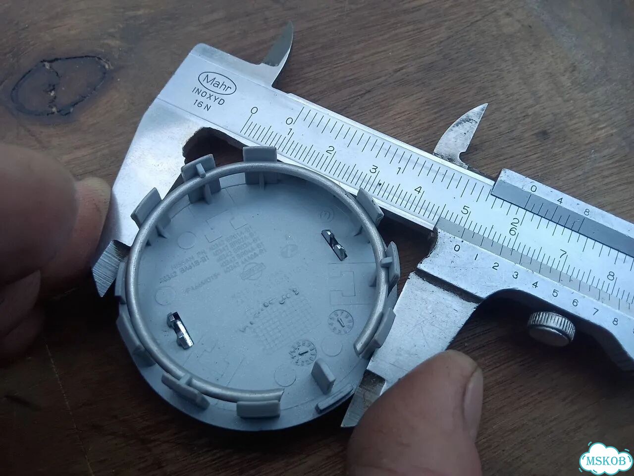 Колпачок литого диска Nissan 40342BR01A фото 8