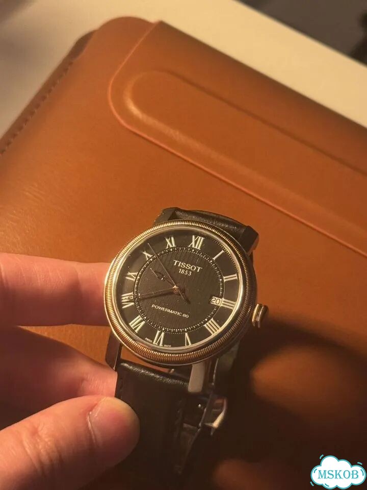 Швейцарские часы Tissot Bridgeport фото 1