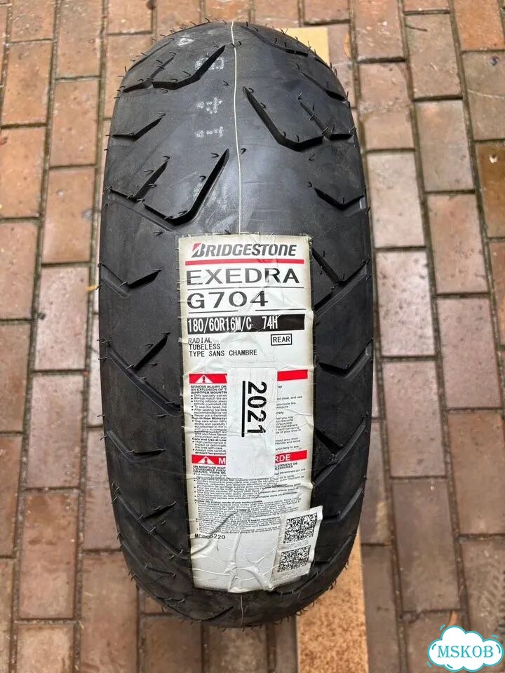 Bridgestone exedra G 704 фото 1