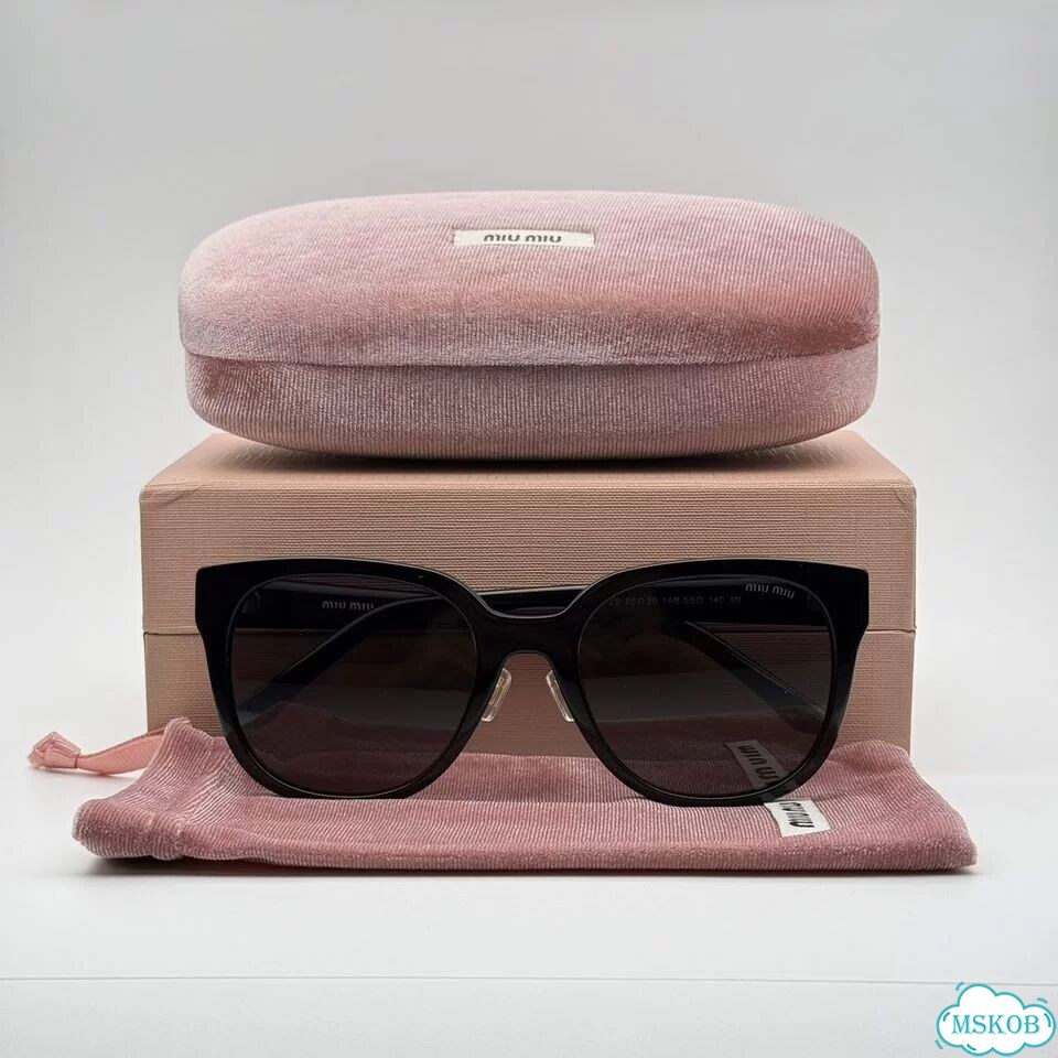 Солнцезащитные очки Miu Miu фото 1