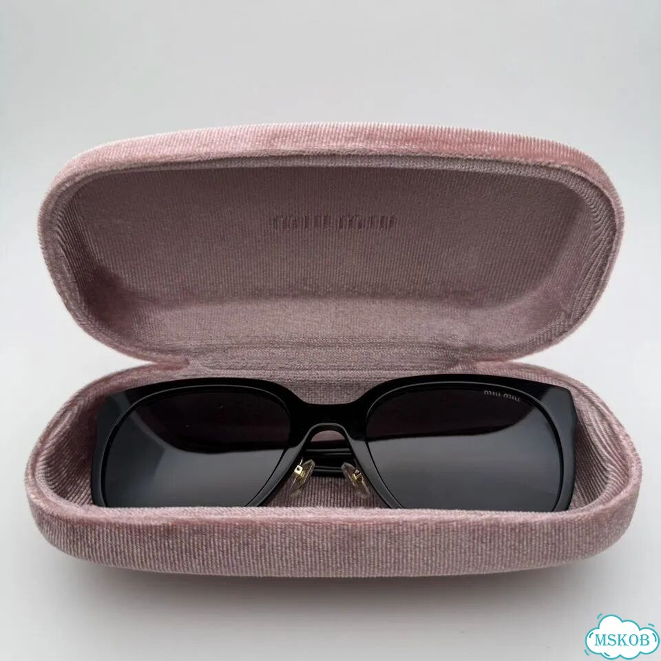 Солнцезащитные очки Miu Miu фото 8